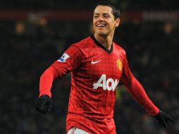 Javier Hernández buscará junto con su equipo ganar la liga, la copa y la Champions. AFP /