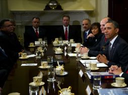 El presidente Obama quiere que todos los compradores de armas sean sujetos a una revisión de antecedentes. AFP /