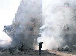 Desolación. Las ciudades sirias están en ruinas, sin esperanza de llegar a la paz. REUTERS /