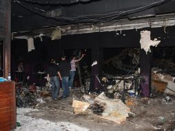 La policía arrestó a cuatro personas, entre ellos los dos dueños de la discoteca. EFE /