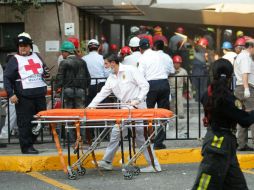 Aspecto de la zona donde se realiza el rescate de personas atrapadas. EFE /