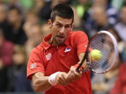 Novak Djokovic ganó el punto que le toca disputar ante Bélgica en la jornada del viernes. EFE /