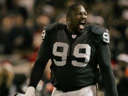 Imagen de archivo de Warren Sapp cuando era jugador de los Raiders, él y otros seis elegidos serán inmortalizados en Canton, Ohio. AP /