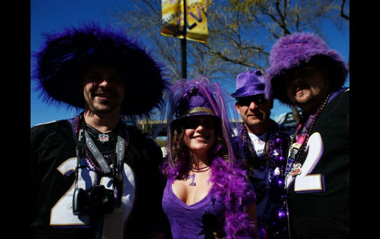 En la imagen, fanáticos de Cuervos se visten en apoyo a su equipo. AFP /