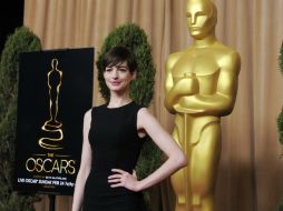 Anne Hathaway llega al almuerzo de los nominados, en 2011, la actriz fue conductora de la gala. AP /