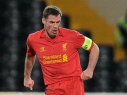 El zaguero acumula 700 partidos con el Liverpool inglés. AFP /