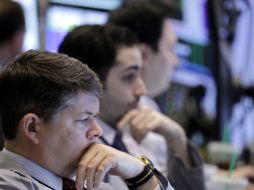Nasdaq retrocede 0.11% AP /