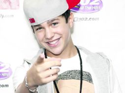 Competencia. El cantante Justin Bieber ahora tiene por qué preocuparse, ya que Austin Mahone (foto) gana terreno en las redes. ESPECIAL /