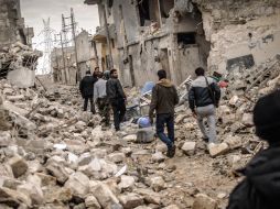 Los enfrentamientos entre los rebeldes y el gobierno siguen dejando graves daños en el país, en la imagen la ciudad de Aleppo. EFE /