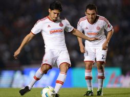 Una jugada de Rafael Márquez Lugo (i) fue la diferencia en el partido para que Chivas sumará su primera victoria. MEXSPORT /