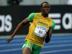 Bolt asegura estar en buena forma, dice que correrá un par de carreras más en 400 metros. MEXSPORT /