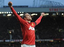 Van Persie ya es considerado un ídolo en el Manchester United y una vez más se hace presente en el marcador. EFE /