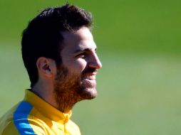 Cesc Fabregas ve como favorito al Real Madrid sobre el Manchester United. AP /