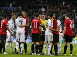 Jugadores del Real después de la batalla europea ante el Manchester United. AFP /