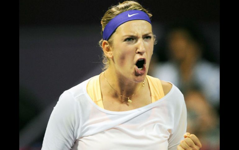 Victoria Azarenka celebra su triunfo sobre la tenista polaca Agnieszka Radwanska. EFE /