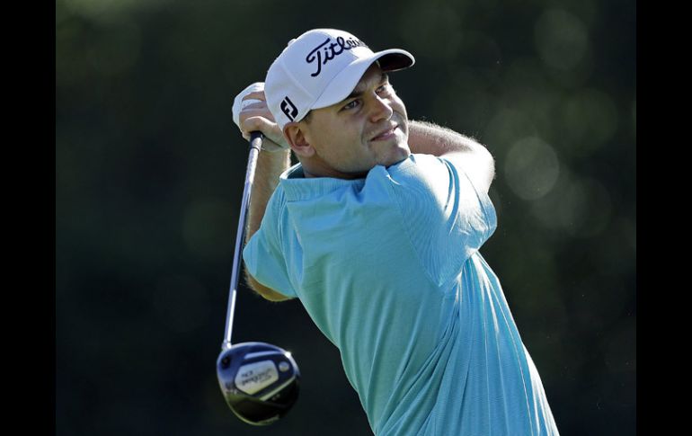 Bill Haas se pone en el liderato del torneo a una sóla ronda de terminar. AP /