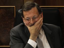 Opositores cuestionaron a Rajoy sobre los presuntos casos de corrupción que afectan al PP. AP /