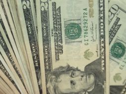 El Departamento de Justicia informa que el banco pagará un promedio de 350 dólares a cada uno de estos clientes. ARCHIVO /