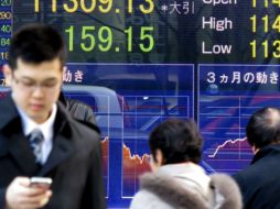 El índice compuesto del mercado Nasdaq desciende 1.04 por ciento. AFP /