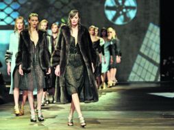 MUESTRA. Colección otoño-invierno 2013 de Prada, que se presentó ayer en la Semana de la Moda en Milán. AFP /