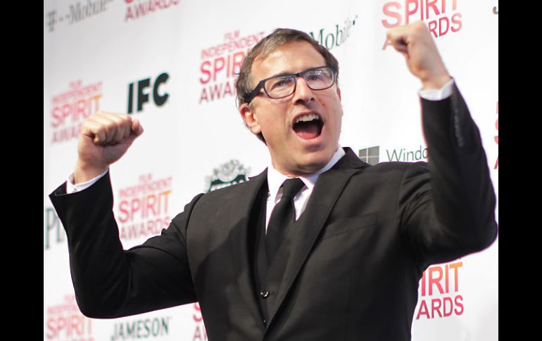 David Russell celebra tras ganar como Mejor Director y Mejor Guión por ''Los Juegos del Destino''. AFP /