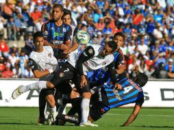 El Querétaro en el partido contra el Atlas. ARCHIVO /