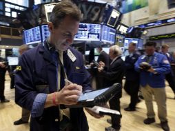 Wall Street cierra el día de hoy con pérdidas en la recta final de la sesión. AP /