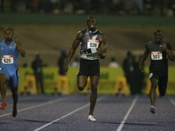 Bolt (c) tendrá en esa carrera la oposición del campeón francés de los 100 metros Christophe Lemaitre. ARCHIVO /