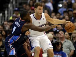 Griffin (der) consigue 24 puntos y se ubica como el mejor del encuentro para Clippers. EFE /