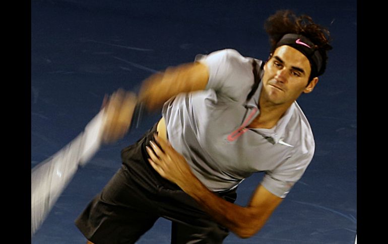 Federer tarda una hora y once minutos en acabar con las esperanzas de su rival. AFP /