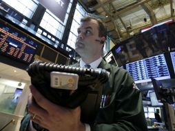 El índice compuesto del mercado Nasdaq aumenta en 1.04 por ciento. AP /