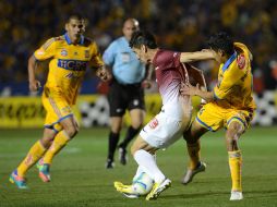 Acción del partido entre Tigres y Morelia de la fecha 9 del Clausura 2013. AFP /