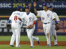 Taiwán celebra su marca perfecta (2-0) en el torneo. AP /