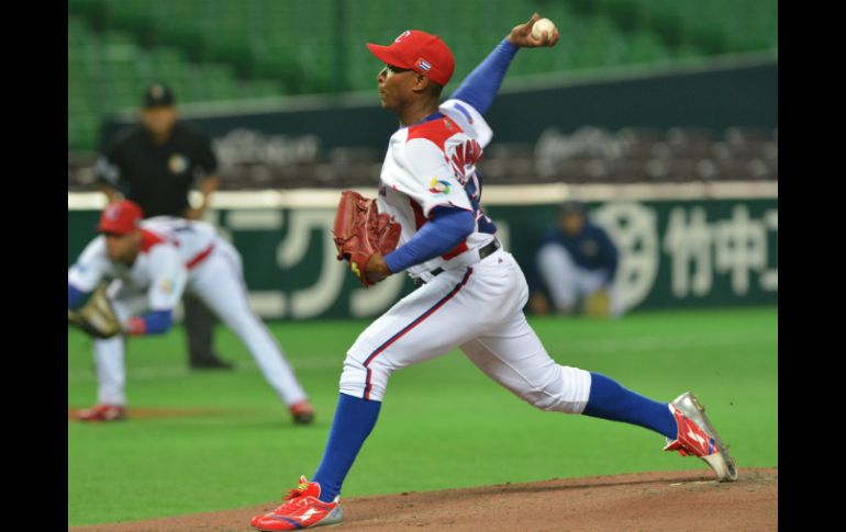 Danny Betancourt lanza cuatro entradas sin permitir anotación. AFP /