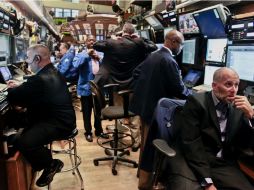 Casi dos tercios de los 30 componentes del Dow Jones de Industriales sufre descensos. ARCHIVO /