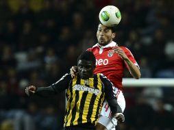 Garay (der) ha jugado todos los partidos del Benfica en calidad de titular desde que arribó en 2011. AFP /