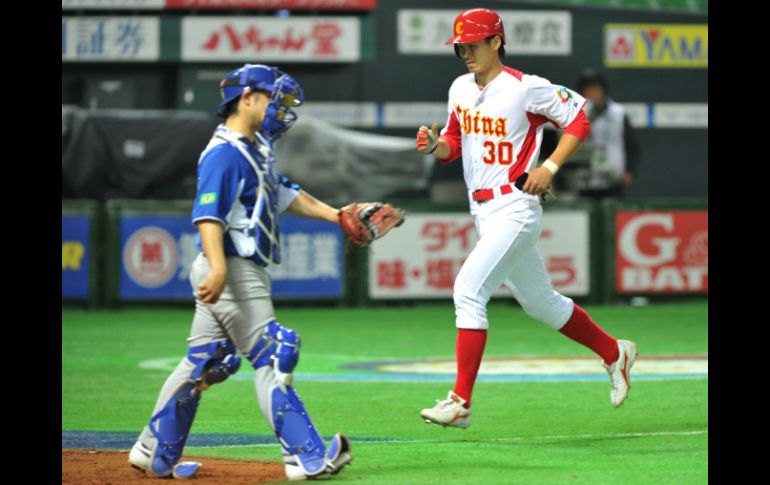 La cuarta jornada dijo adiós a Brasil en su debut y despedida del Clásico Mundial de Beisbol. AFP /