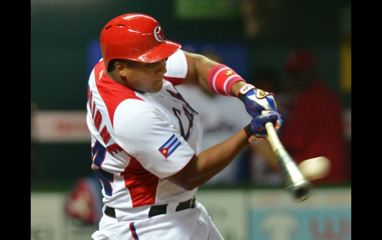 Con el jonrón en la octava entrada, Despaigne da la victoria a su país. AFP /