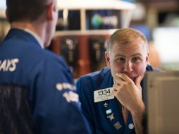 El Dow Jones logra su tercer máximo histórico gracias a una mejoría en el mercado laboral estadounidense. ARCHIVO /