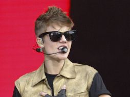 El ídolo juvenil tuvo que ser tratado por los médicos tras sentirse enfermo y falto de aire en medio del tercer concierto en Londres. ARCHIVO /