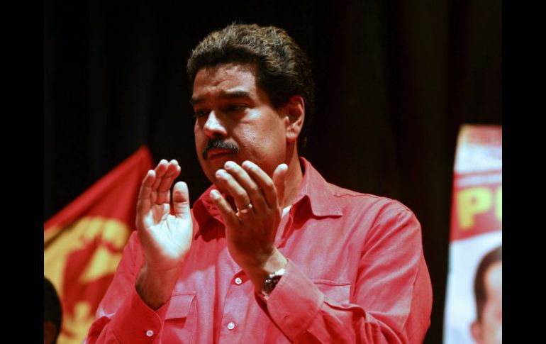 El actual candidato Nicolás Maduro llamó a los venezolanos a mantener la paz. AFP /