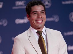 Al recibir el trofeo, Dias agradeció a Dios, a sus padres y a su esposa, y dijo que todavía tiene mucho para dar al deporte. AP /