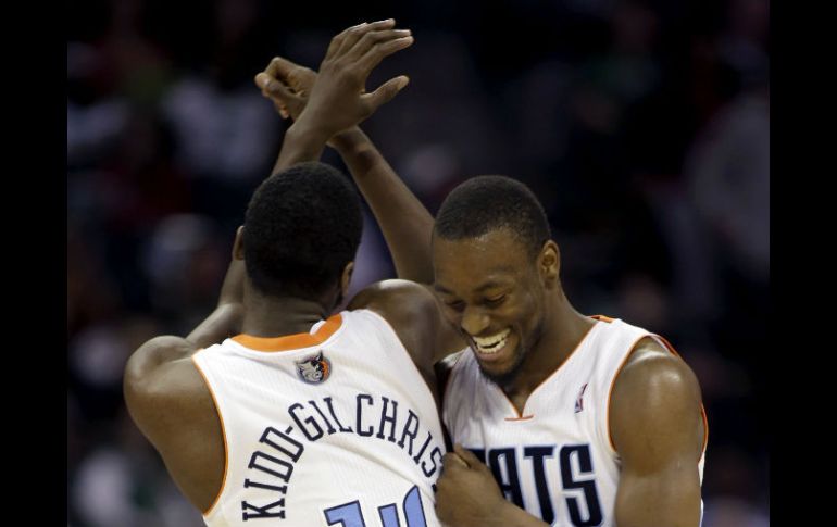 Jugadores de los Bobcats celebran su triunfo sobre los Celtics de Boston. AP /