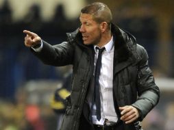 Simeone destaca lo hecho por su plantilla luego de la victoria del Barcelona sobre el Milán. ARCHIVO /