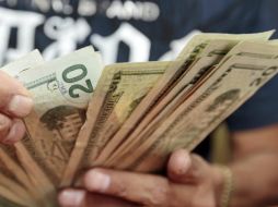 El menor precio a la compra en ciudades fronterizas es de 12.00 pesos. ARCHIVO /