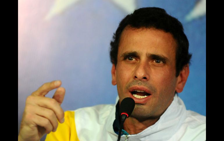 Capriles se compromete a no entregar al país a ''cualquier interés extranjero''. EFE /