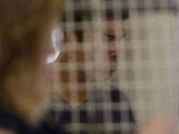 Uno de los inculpados escucha la lectura de auto formal de prisión. EFE /