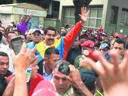 Fuego cruzado. Nicolás Maduro, presidente interino, acusó a su rival de atacar a su equipo. EFE /