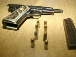 Al asaltante de tiendas se le aseguró una pistola calibre .38 especial. ARCHIVO /
