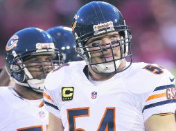 Jefe de la defensiva. Brian Urlacher comandó a los Osos que perdieron el Super Bowl ante Indianápolis en la campaña 2006. AP /